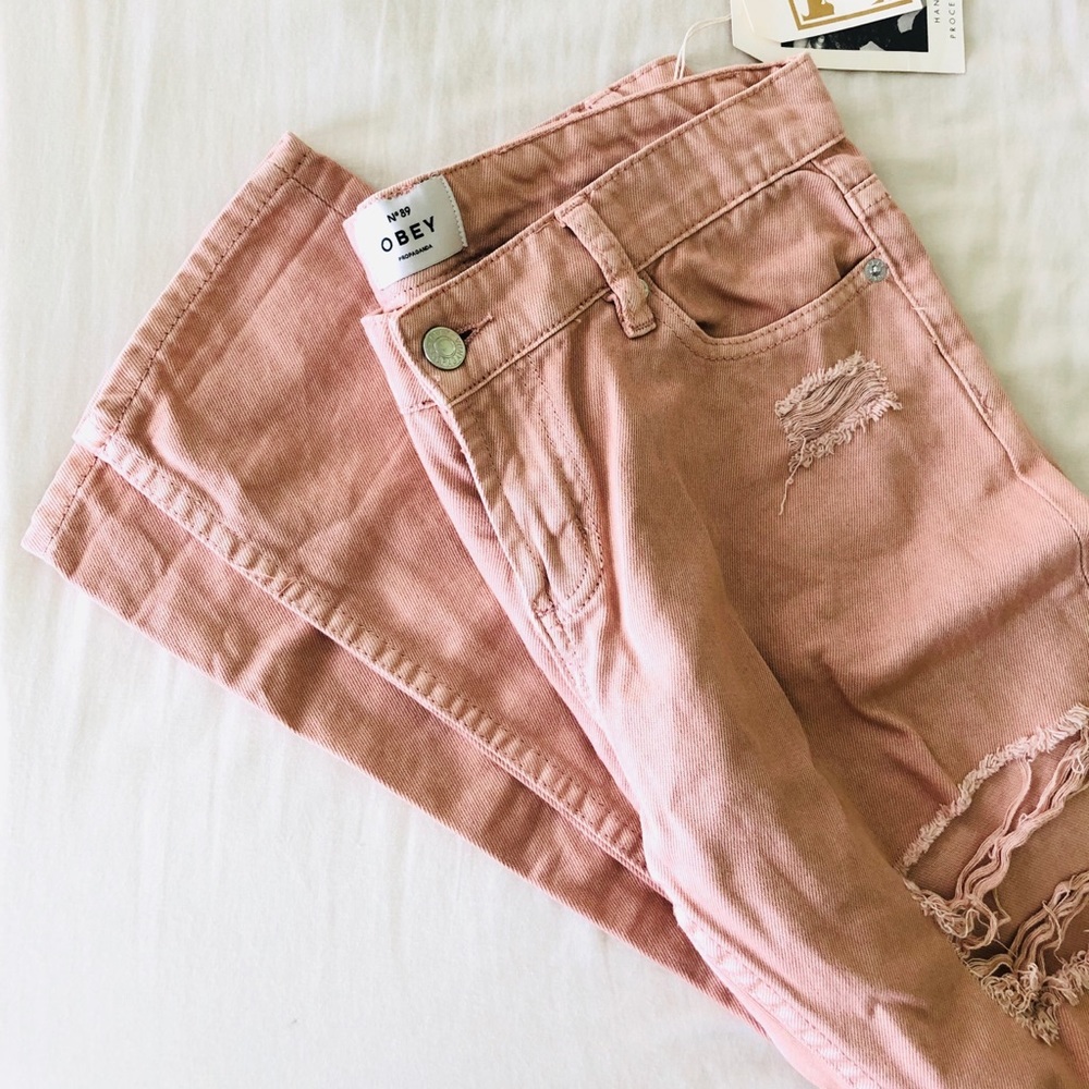 OBEY light pink ripped jeans (loose fitting)
